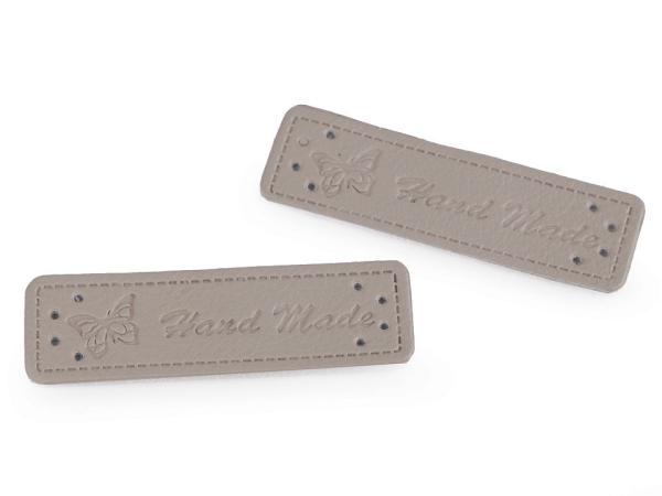 Applikation aus Kunstleder Graubraun Schrift Hand Made ca. 15x50 mm